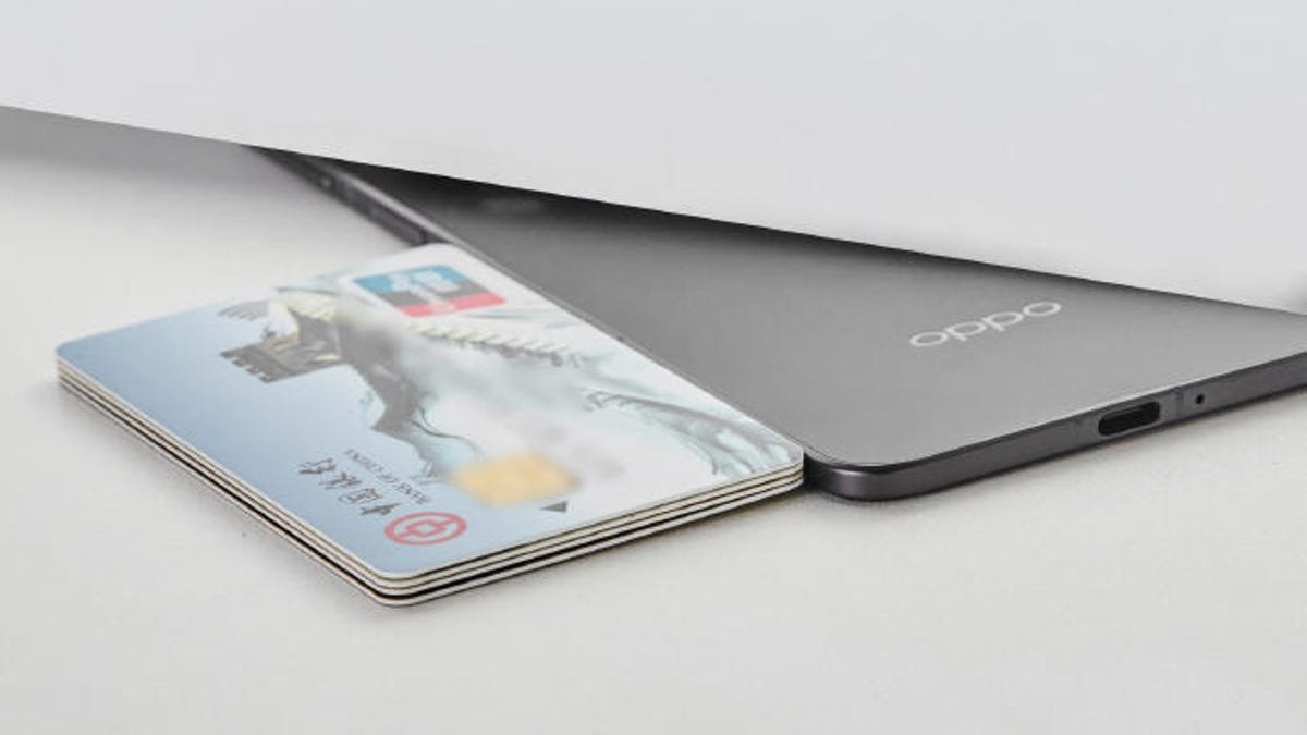 oppothin Oppo's new foldable phone is thinner than a stack of 4 credit cards