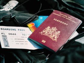 A file image of a passport and airline boarding pass.