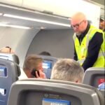 'High As A Kite' American Airlines First Class Passenger Calls 911 To Force Takeoff—7 Cops Rip Him From His Seat