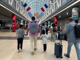 Johnny Jet and kids walking in ORD