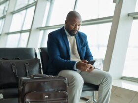 Man sitting at an airport gate