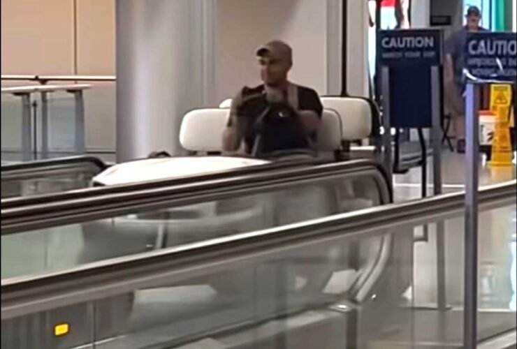 Drunk Traveler Steals Airport Cart And Takes It on a Joyride on Moving Walkway Through New York Airport -