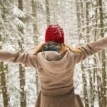 woman-arms-outstretched-winter