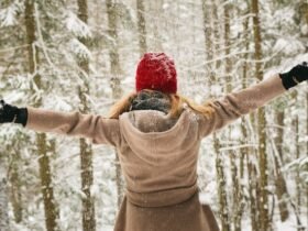 woman-arms-outstretched-winter