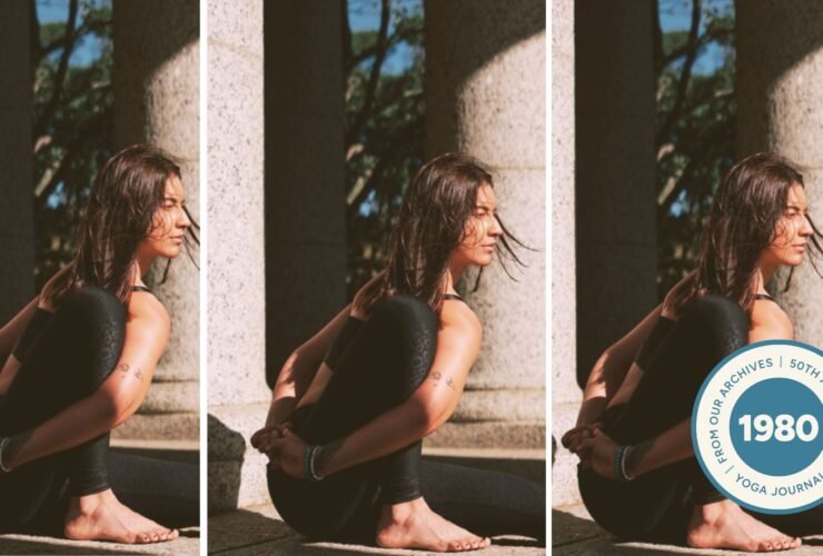 Woman practicing Marichyasana III outdoors.