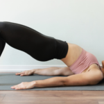 A woman in Bridge Pose, one way to strengthen the pelvic floor