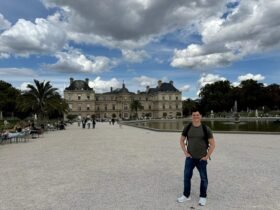 nomadic matt in front of the luxembourg gardens